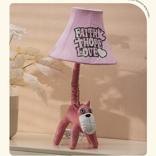 Pink children's table lamp with a design featuring a kitten named Pinkie and a lampshade with the inscription "Faith Hope Love," model DS-066
